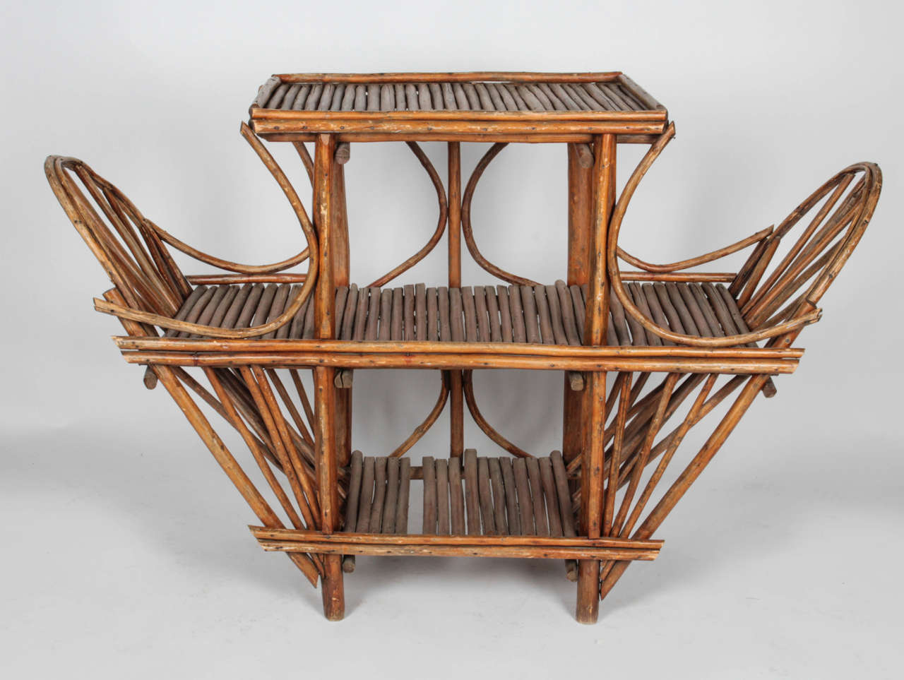 A very unique addition to your pool side, this bentwood stand would look great filled with rolled towels. One wood slat missing on the bottom shelf (see pictures)

Not available for sale or to ship in the state of California.