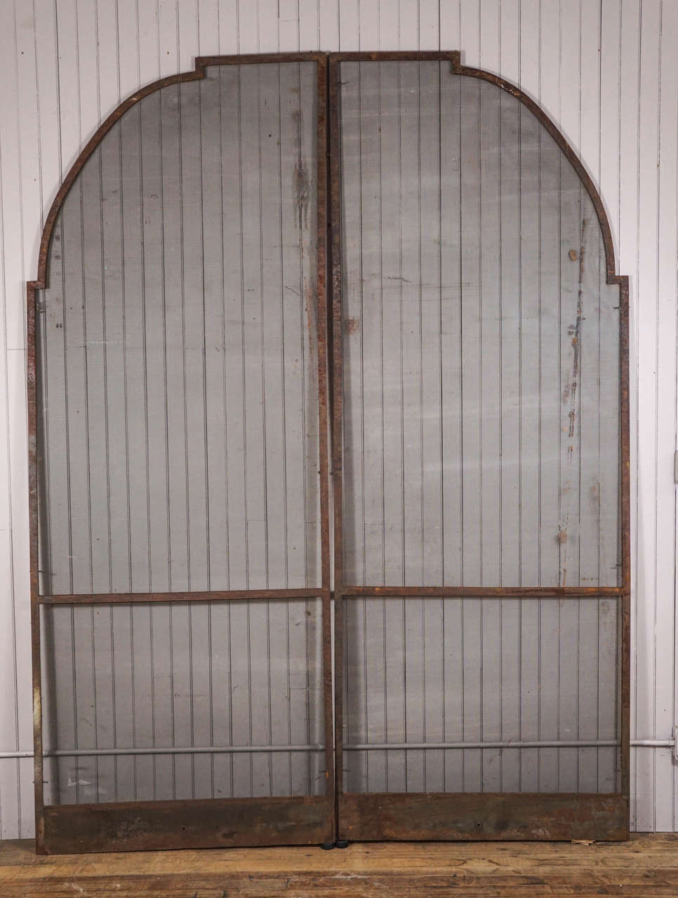 Large pair of Gothic style screens, wrought metal frames, rusted patina, 3