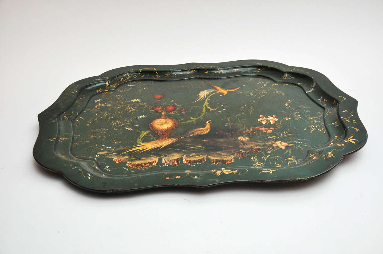 English Chinoiserie-decorated green-ground lacquered Papier-Mâché tray, circa 1850. Note that the decoration flows over the rim.