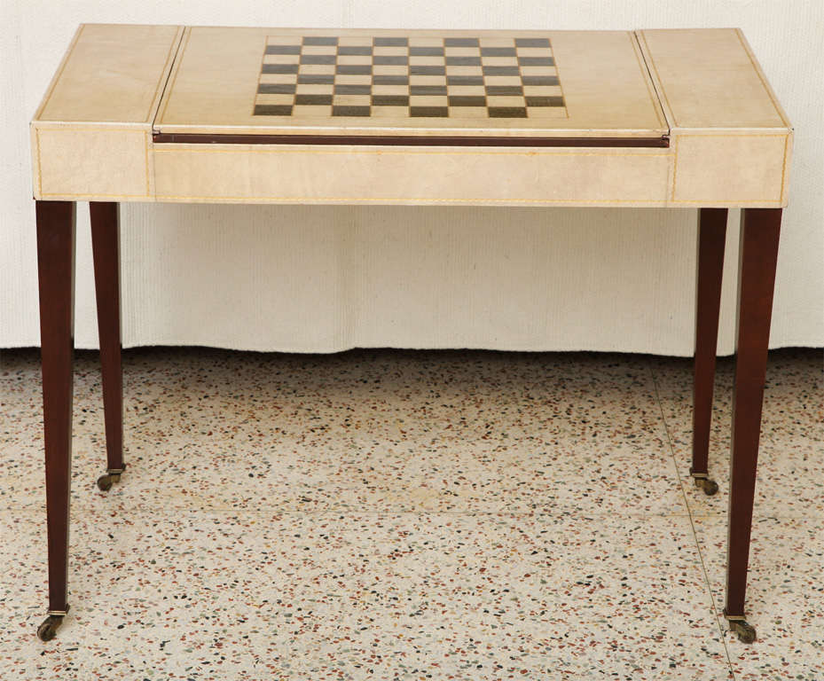 SOLD FEBRUARY 2012 Tric-Trac, backgammon, chess, checkers or any card game...here's your table.  Gorgeous absolutely wonderful games table entirely in tooled leather, except for the Louis XVI style mahogany legs ending in brass casters.  With a