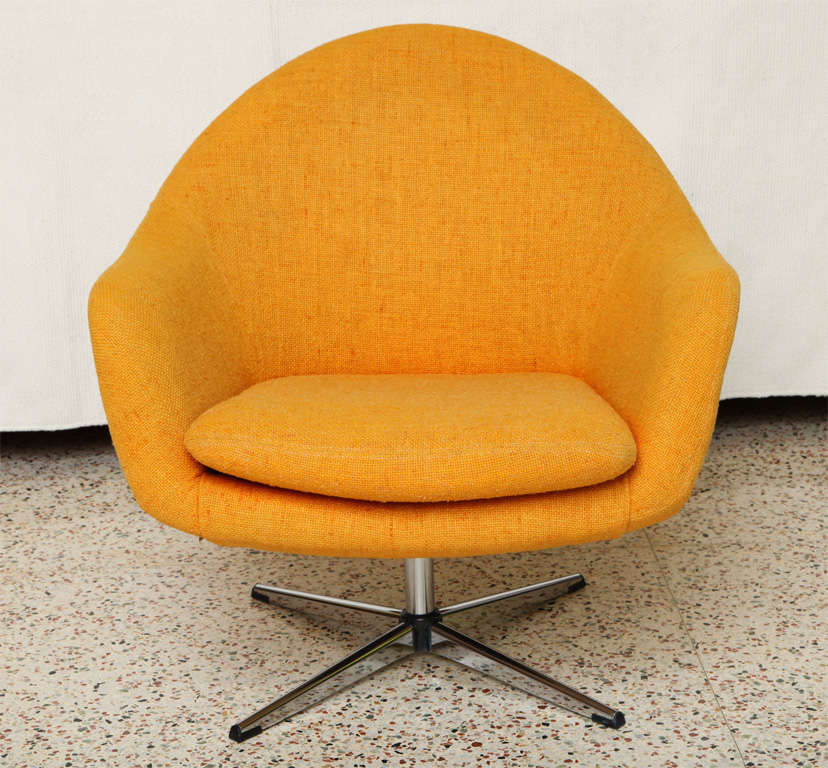 SOLD JAN 2012 An exciting lounge armchair from the Swedish designer Carl Eric Klote who founded Overman in the late 1950's, makers of iconic modern Scandinavian furniture. With its egg chair style, it swivels and has a star form chromed steel legs.