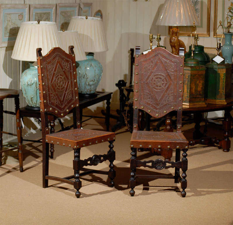 Studded leather chairs