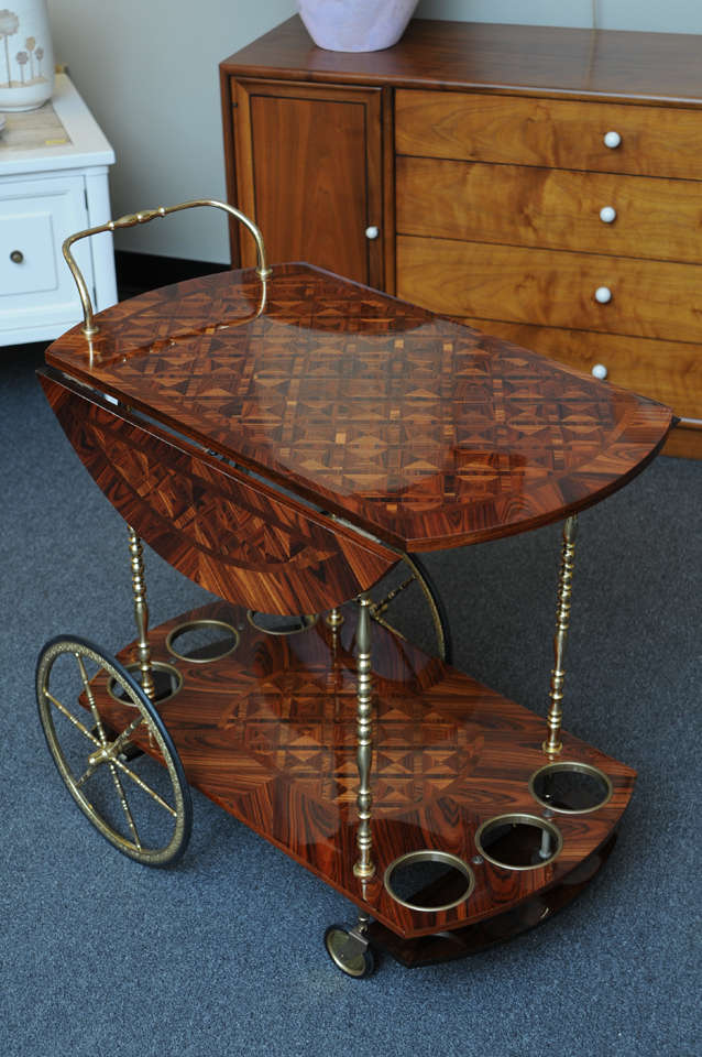 ...SOLD...Stunning beautiful Italian brass appointed rolling cart in Rosewood parquetry exquisitely rendered.  With two tiers, the top has drop leaf sides opening to a circular serving top...the bottom tier incorporating six circular drops for