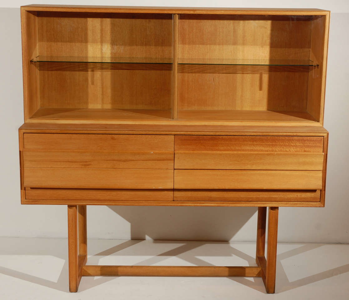 Exceptional two-piece Mid-Century sideboard by Paul Laszlo for Brown Saltman. Hole drilled in back.