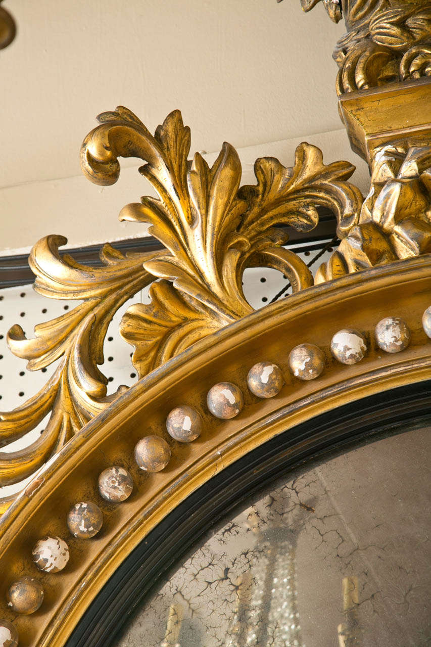 Very Large Giltwood  Convex Mirror with  Eagle Top In Fair Condition In Woodbury, CT