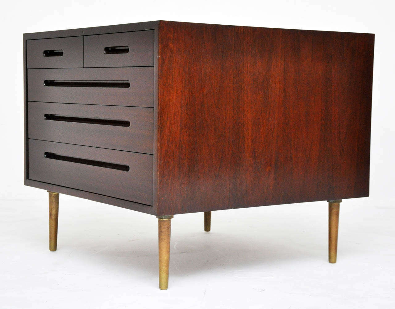 Chest of drawers/lamp table by Edward Wormley for Dunbar.  Espresso finish mahogany case with extra deep drawers over brass legs.