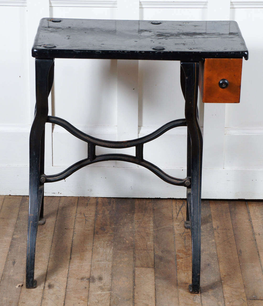 cast iron stand - black enamel with pin striping - one drawer in wood suspended from top