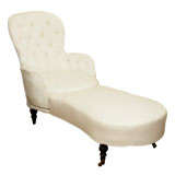 Antique chaise with tufted back