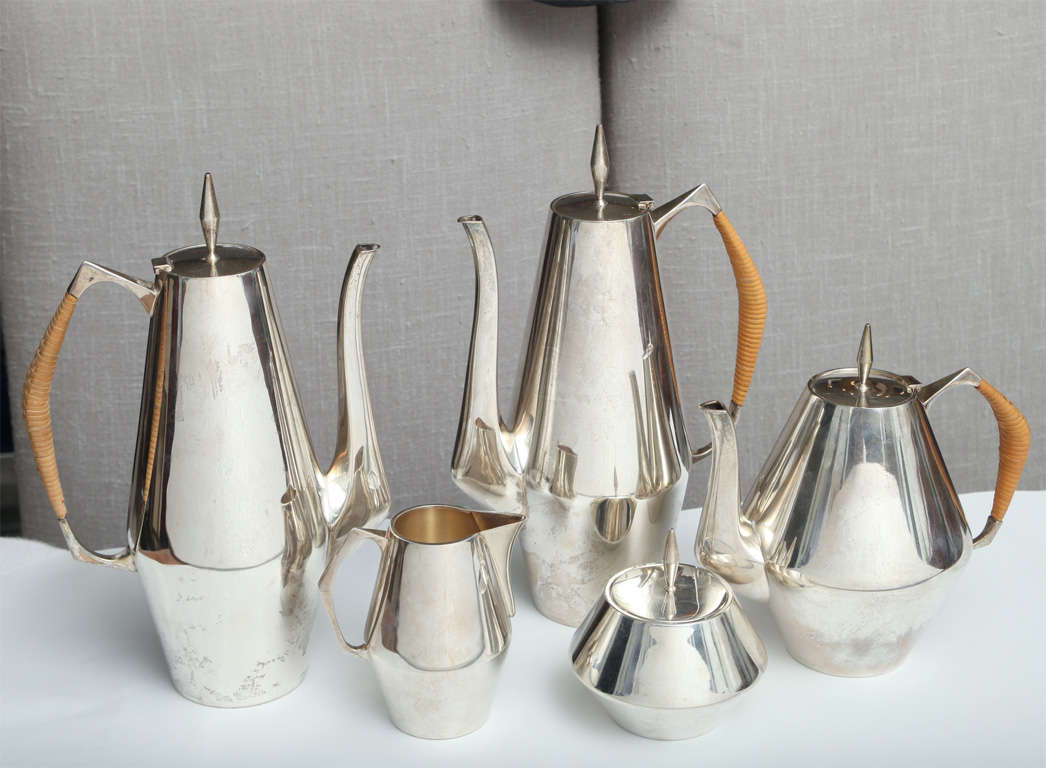 diamond pattern, comprising 2 coffee pots, one tea pot, 2 sugar and 2 creamer- height of coffee is 11 3/4