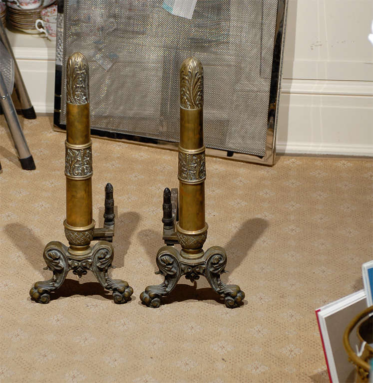 PAIR OF DECORATIVE  BRASS ANDIRONS<br />
AN ATLANTA RESOURCE FOR FINE ANTIQUES<br />
WE HAVE A VERY LARGE INVENTORY AVAILABLE ONOUR WEBSITE.  TO VISIT GO TO: WWW.PARCMONCEAU.COM