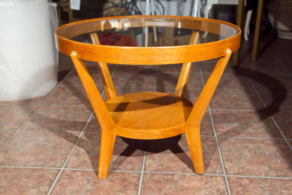 Round oak & beech wood table with glass top and lower shelf