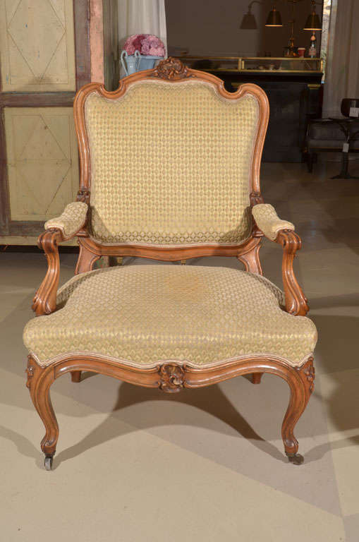 Hand-Carved Stunning Louis XV Style Fruitwood Fauteuil For Sale