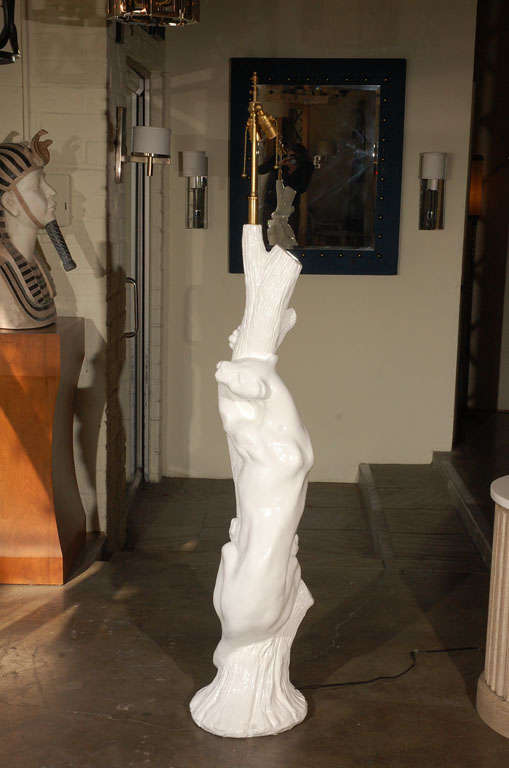 Monumental pair of panther table lamps in white lacquer.