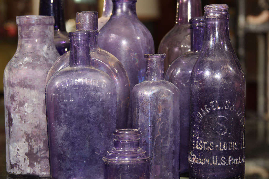American collection of 11 purpling bottles
