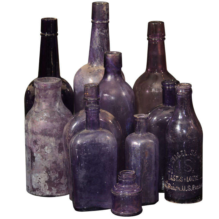 collection of 11 purpling bottles