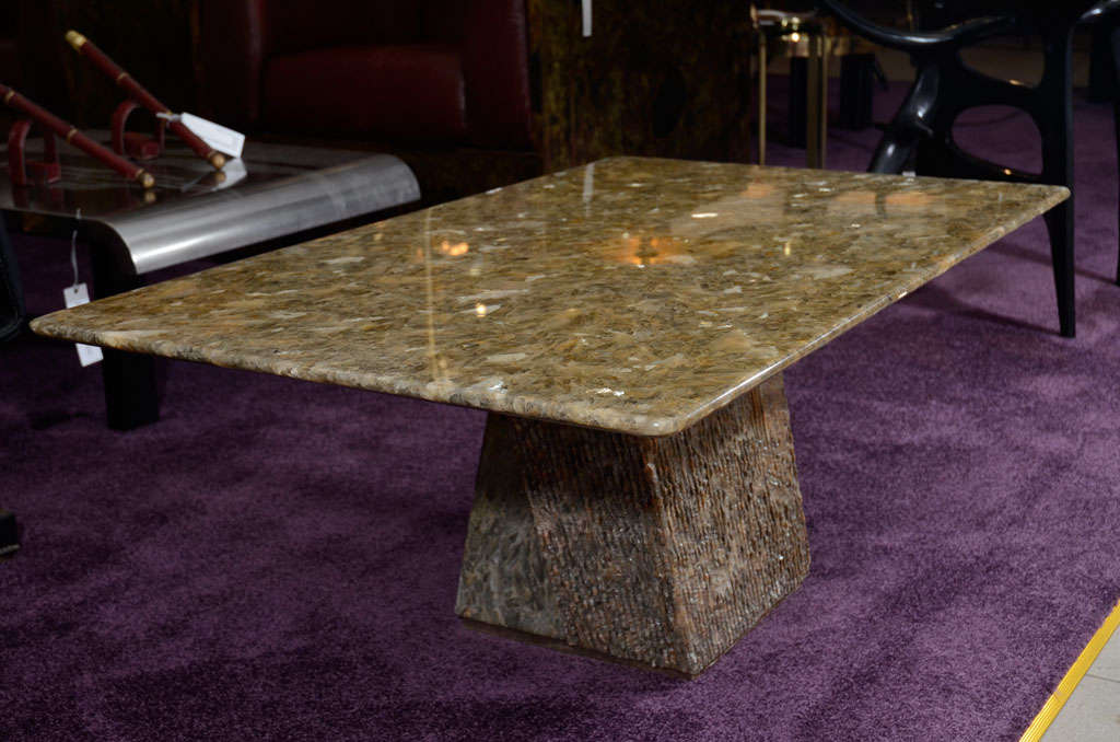 Delicately carved Mika coffee table. 

The entire table is made of a single block of Mika. 

Mika stone has a natural green, light brown and white tint.