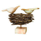 Skulptur "C. Jer" mit Vögeln im Nest