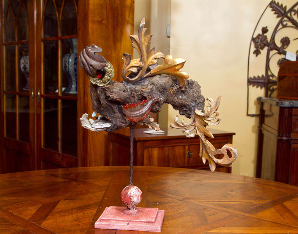 Unique, whimsical and original sculpture made from antique gilded carvings and vintage Murano glass. This particular fish is shown with a heavy eyebrow and murano teeth! One of two remain in stock.