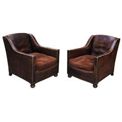 Antique pair  of French leather arm chairs