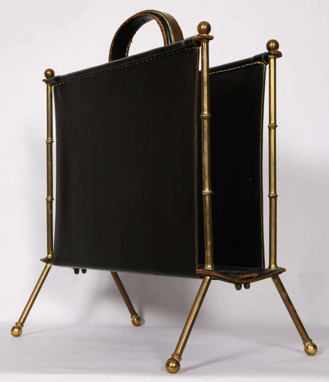 1950's book rack in stitched leather & brass