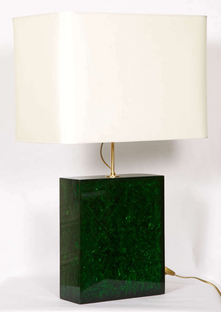 Pair of lamps in emerald resin.