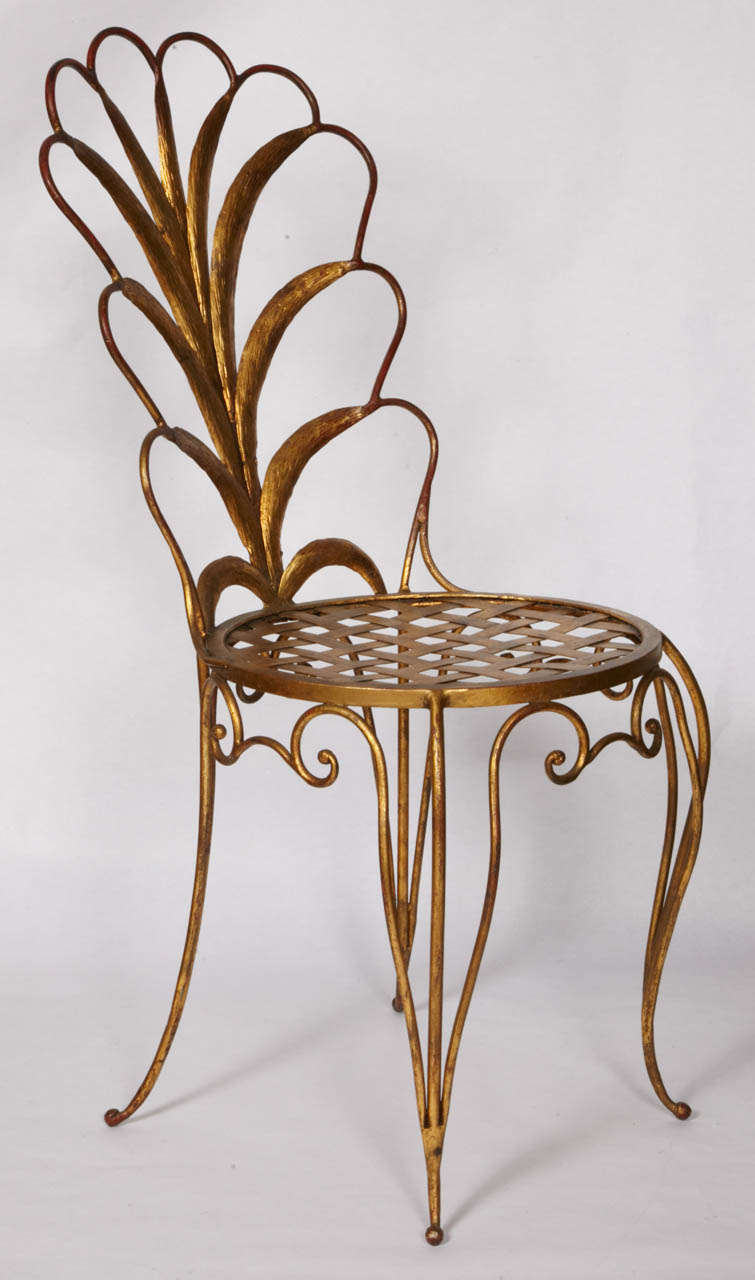 1040's pair of chairs in gilt iron by French designer René Drouet.