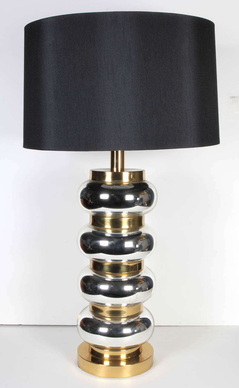 A mercury glass and brass table lamp with an optional new black paper drum shade. Price is for lamp only. The shade is $75 additional + shipping. Measurement to top of socket.