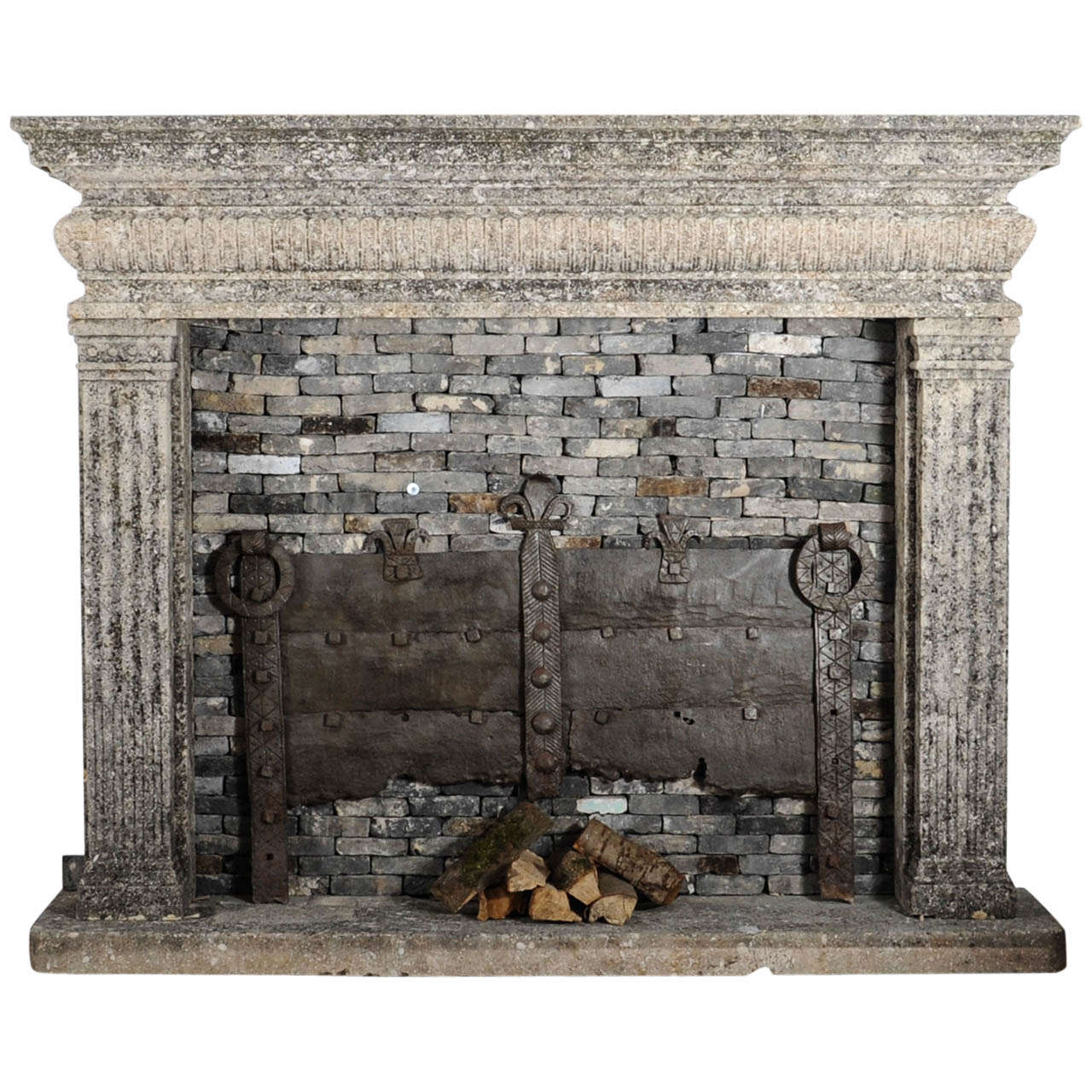 An 18th century limestone Italian  fireplace 