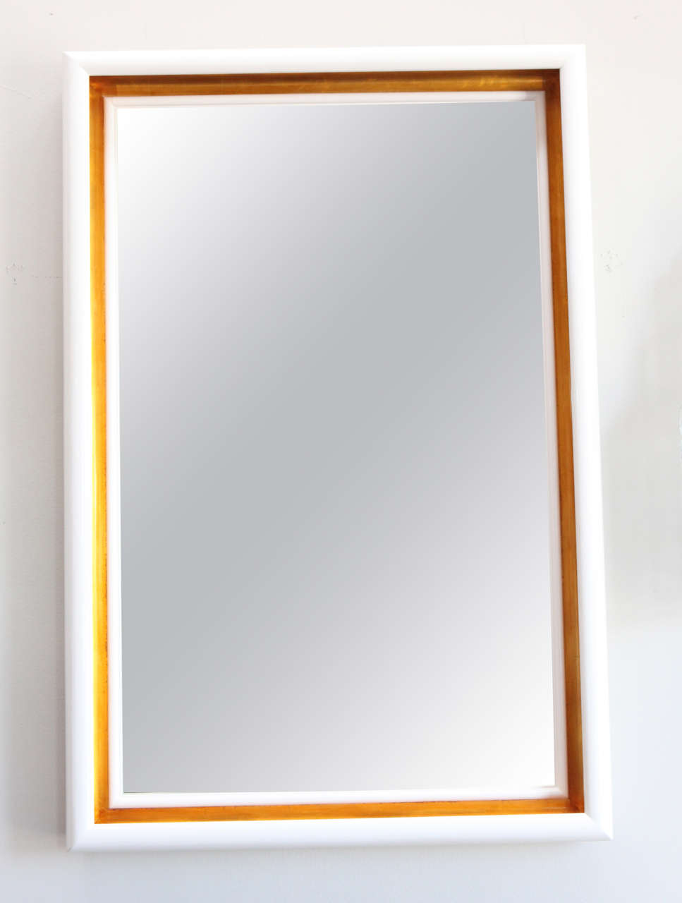 Paul Marra Design Cove Mirror in high gloss polished lacquer and Dutch Gold.