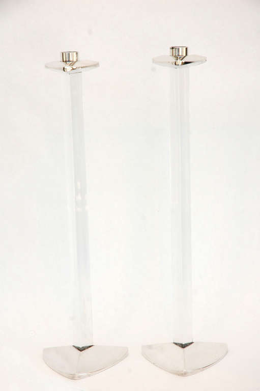 A sensational pair of tall candlesticks by Riedel from their 