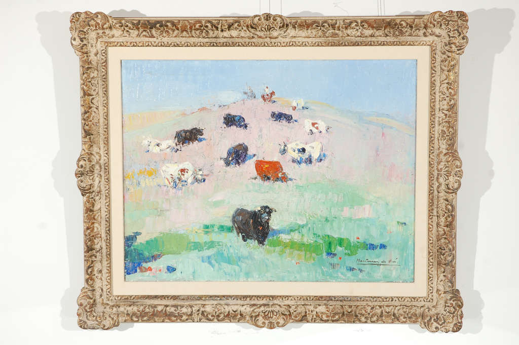 A beautiful pastoral scene of grazing cows rendered in oil on canvas laid to board by late Spanish artist Andrés Martinez de Leon. Signed by the artist. In its original gessoed wood frame.