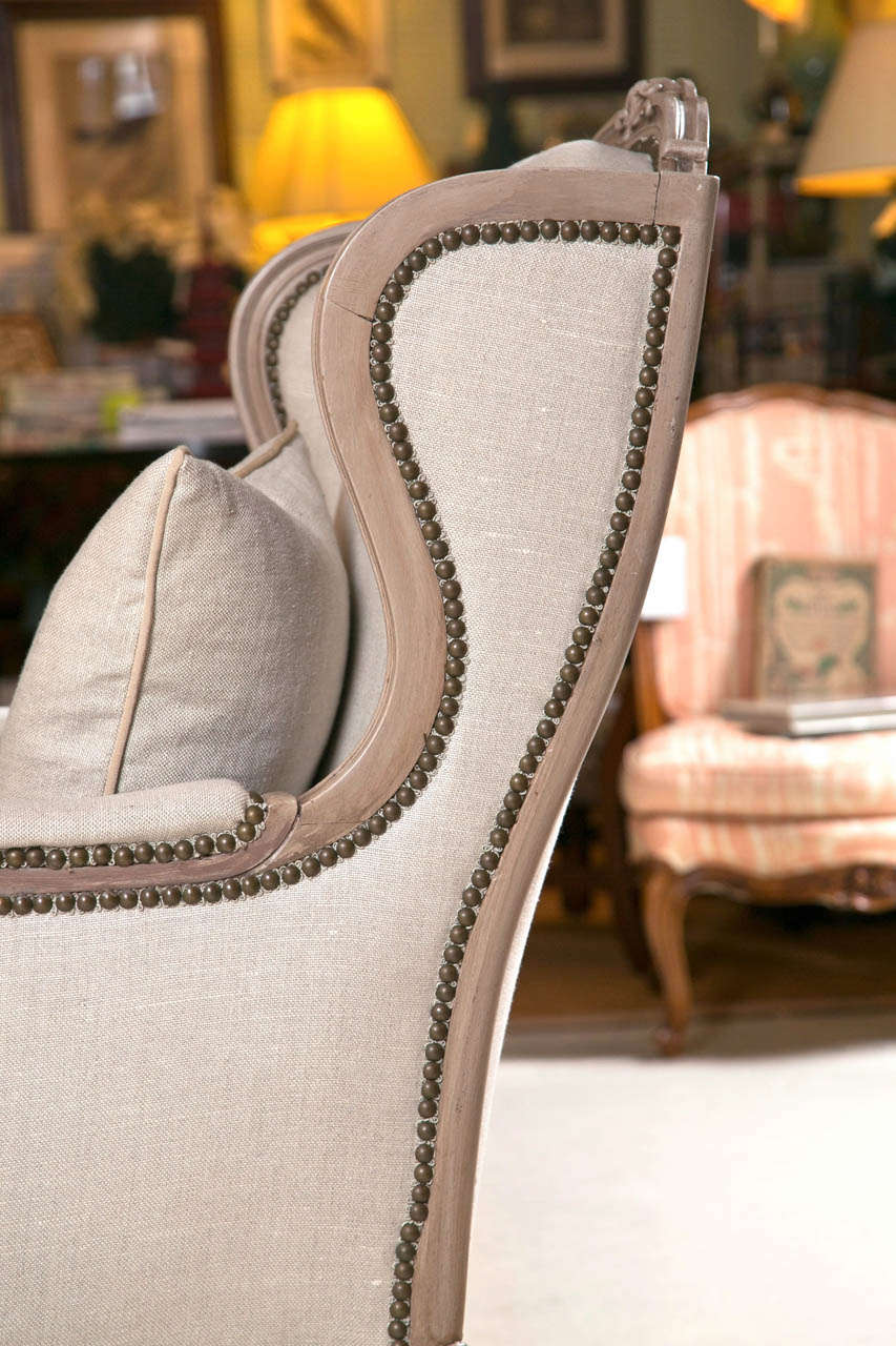 20th Century Pair of French Wingback Chairs In Linen Upholstery with Nail Heads