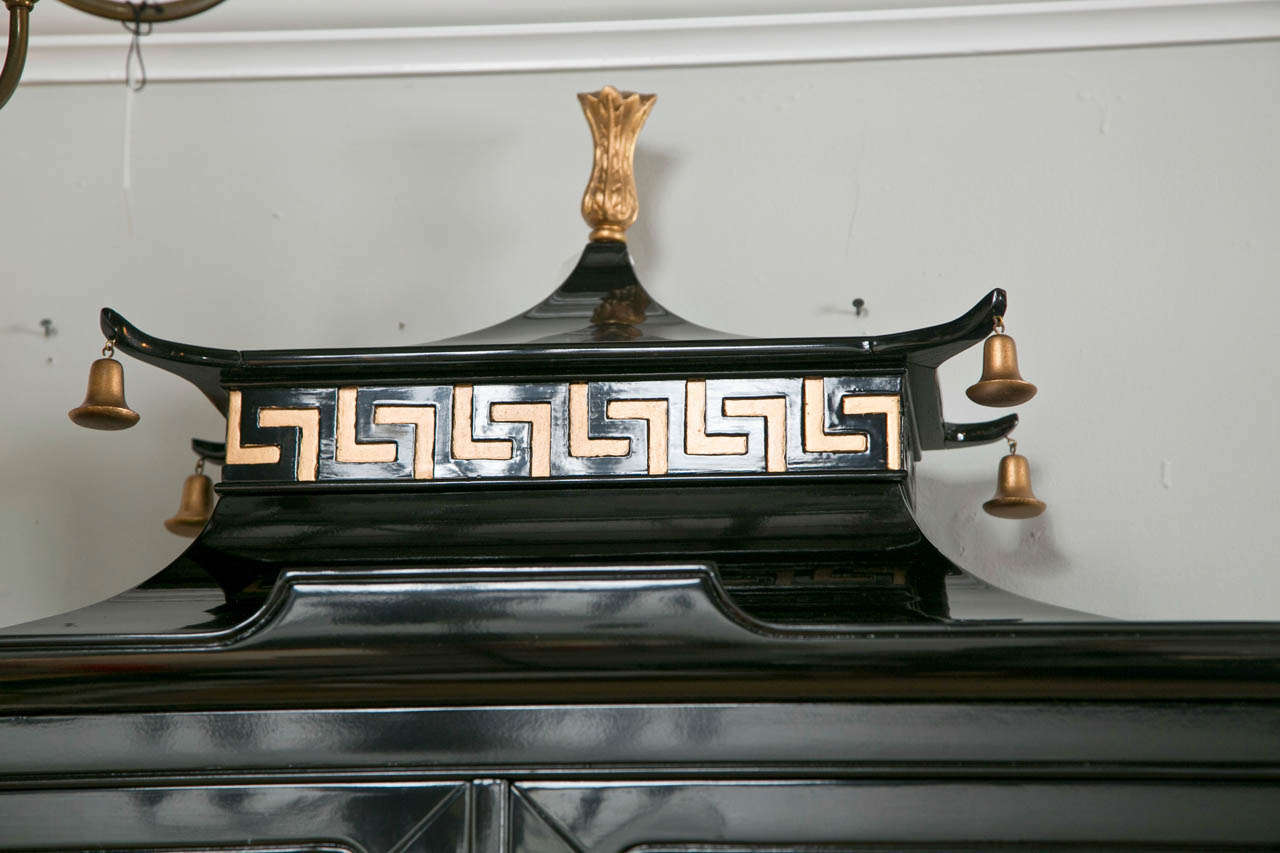 1960's Tomlinson black chinoiserie pagoda cabinet, newly laquered