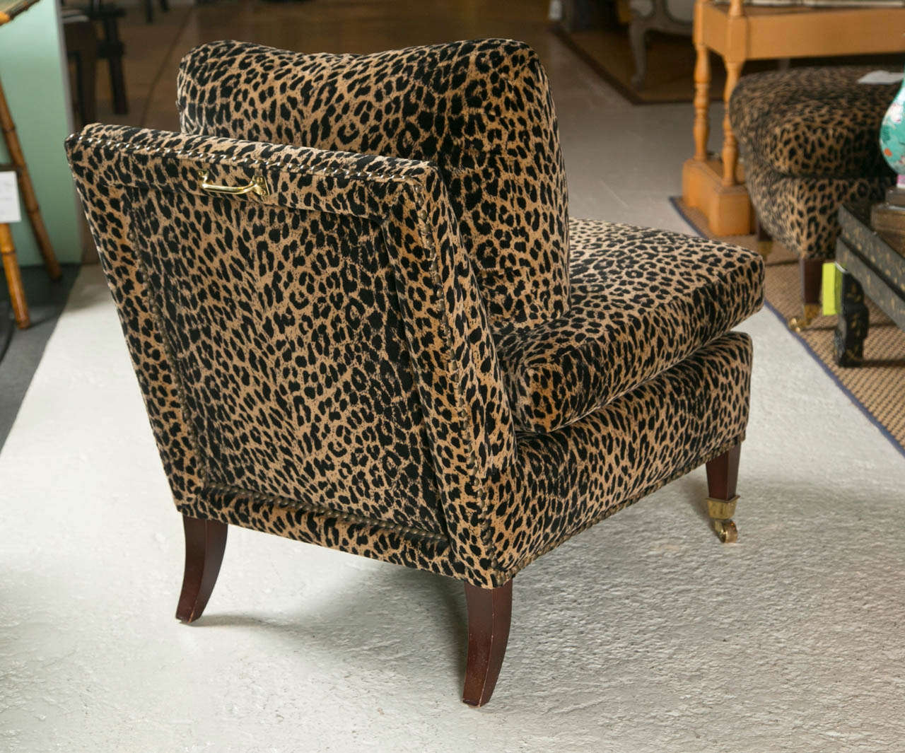 MidCentury Lolling Chairs Upholstered in Animal Print Upholstery at
