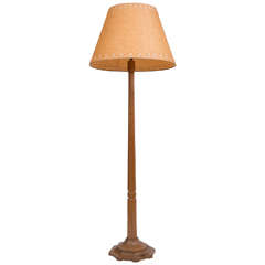 A Robert Thompson “Mouseman” Standing Lamp.