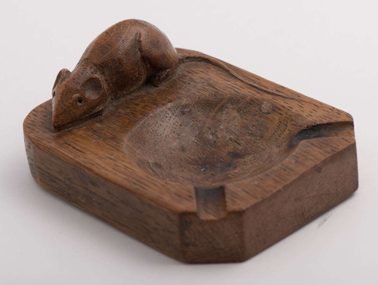 A Robert  “Mouseman” Thompson Oak Ashtray.
Carved Mouse.
English.
Circa 1970
2 x 10 x 7.5 cms.