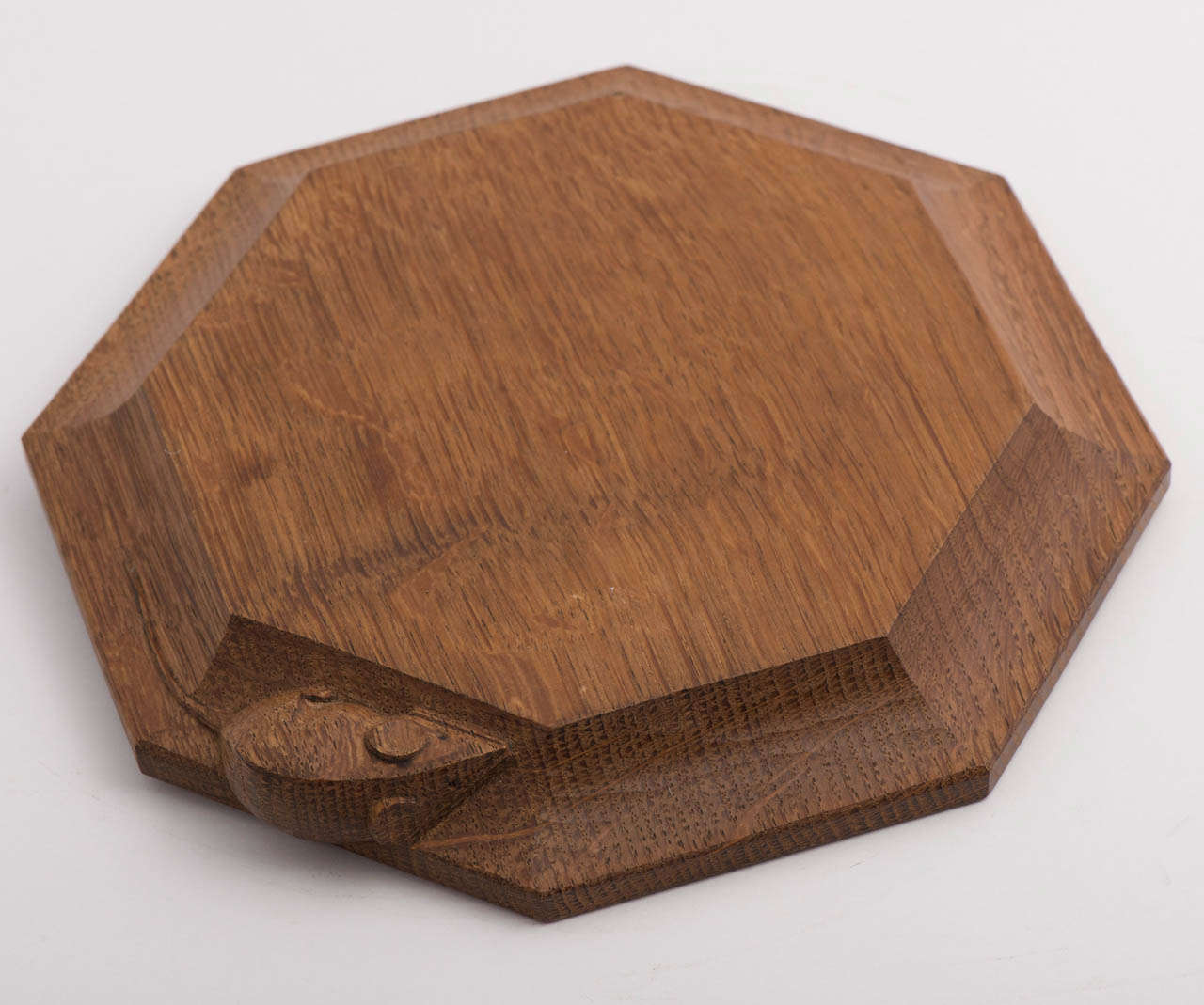 A Robert  Mouseman Thompson oak Cheese Board.
Carved Mouse to side.
English.
Circa 1970
3 x 19 x 19 cms.