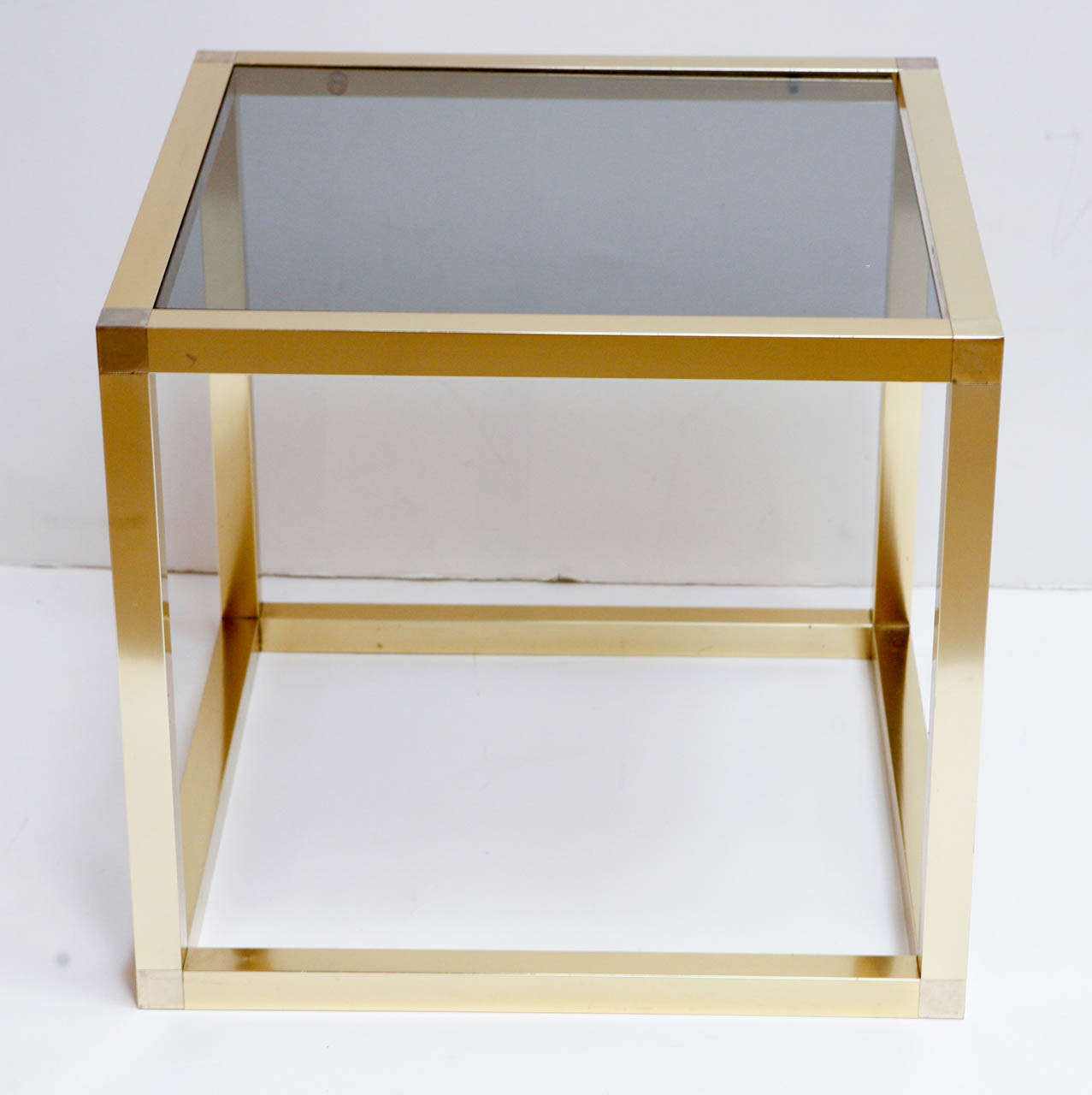 Pair of master craft square brass and smoked glass side tables.