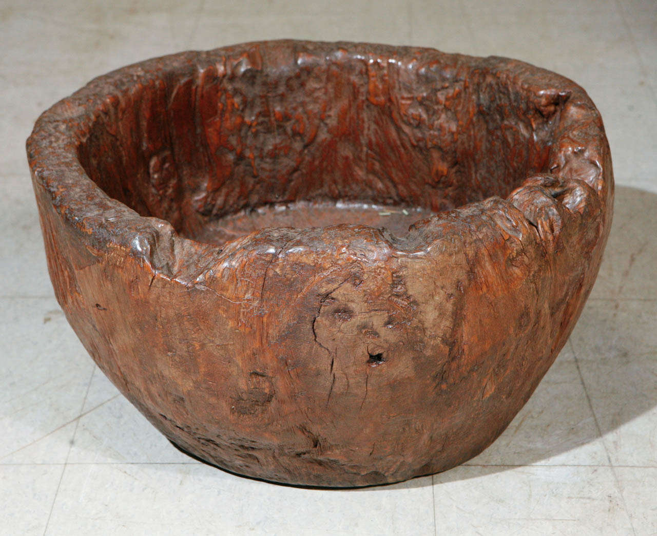Antique mortar bowl from a granary, dense and intriguing teak burl hardwood. Rare, rural Java, circa early 19th century.