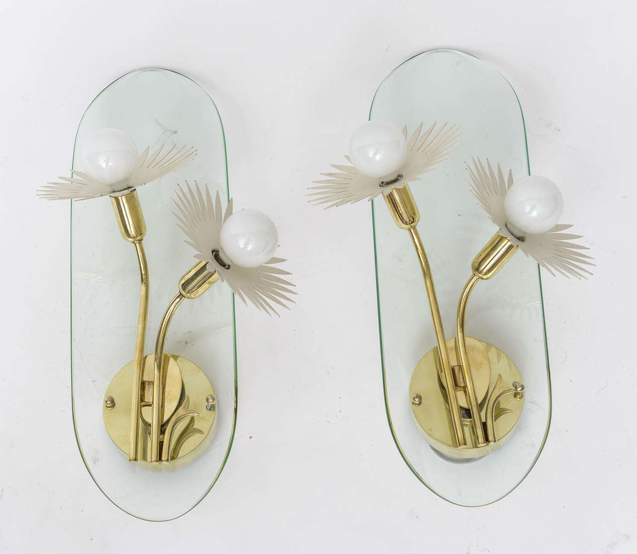 1950s Italian brass and glass wall sconces in the manner of Pietro Chiesa for Fontana Arte, with whimsical white enameled flower sockets. Professionally polished and re-wired.