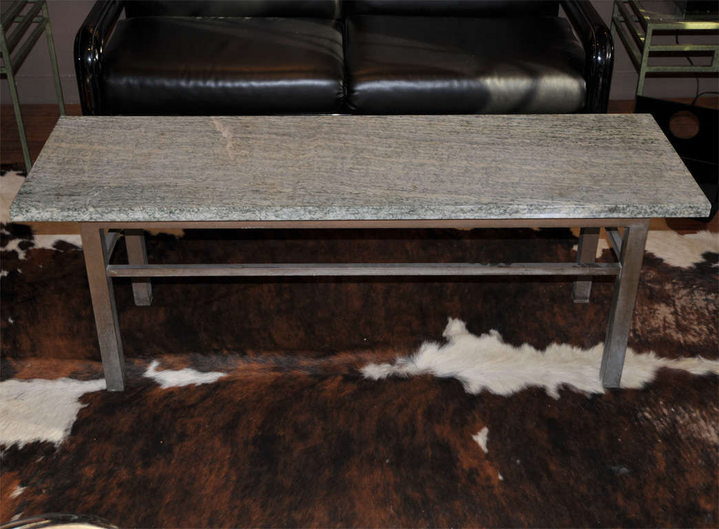 1950s coffee table with brass base and vert-de-mer marble top.