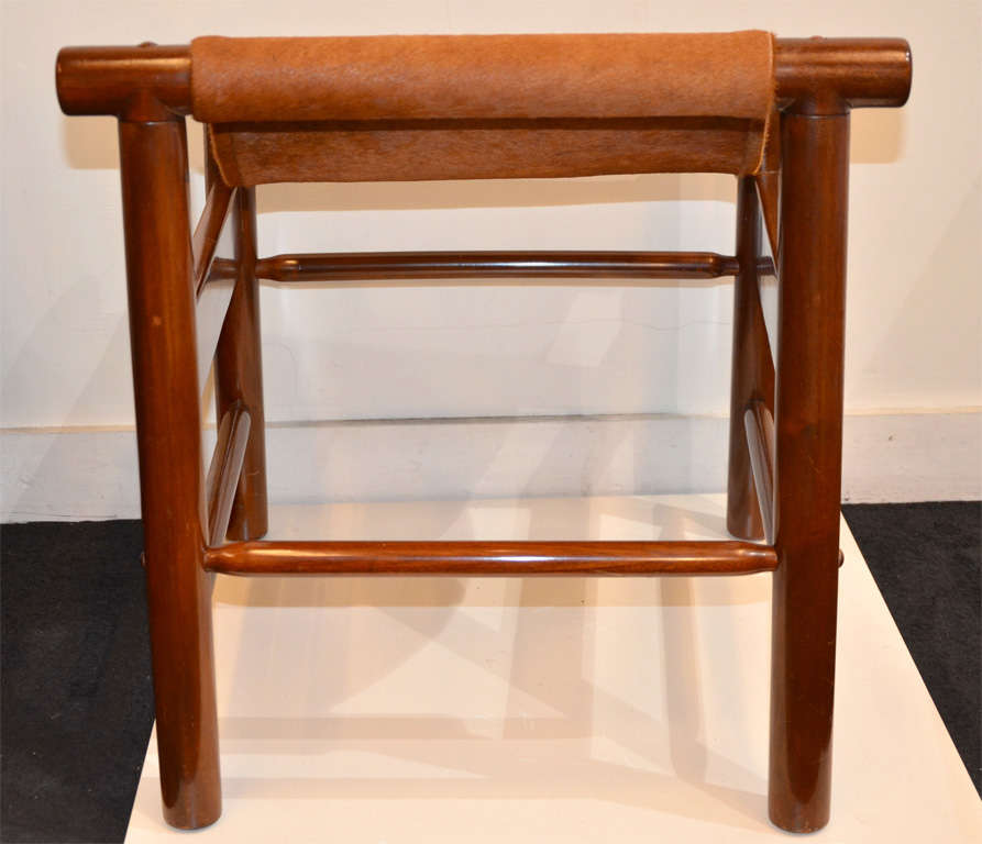 A pair of  wood and colt skin stools by Dujo . 4