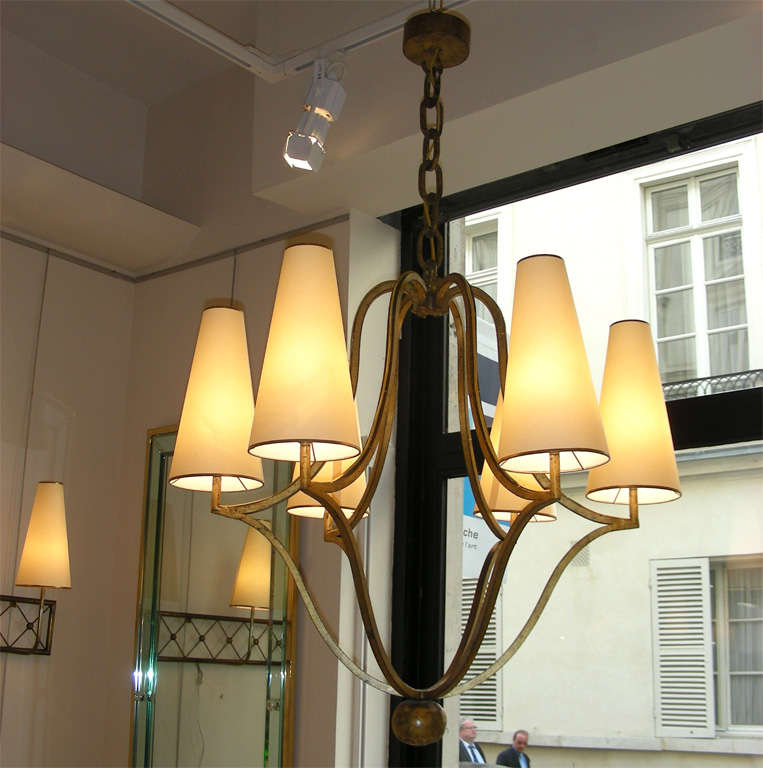 large 6 lights chandelier by JEAN ROYERE in gilded wrought iron