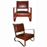 JACQUES ADNET pair of rare lounge chairs in hand stitched leathe