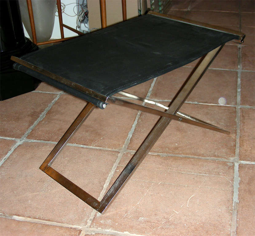20th Century pair of folding stools in steel and black leather