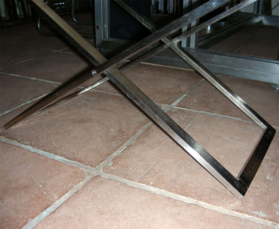 pair of folding stools in steel and black leather 2