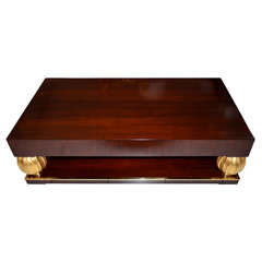 Coffee table in rosewood and gilded carved sphere details