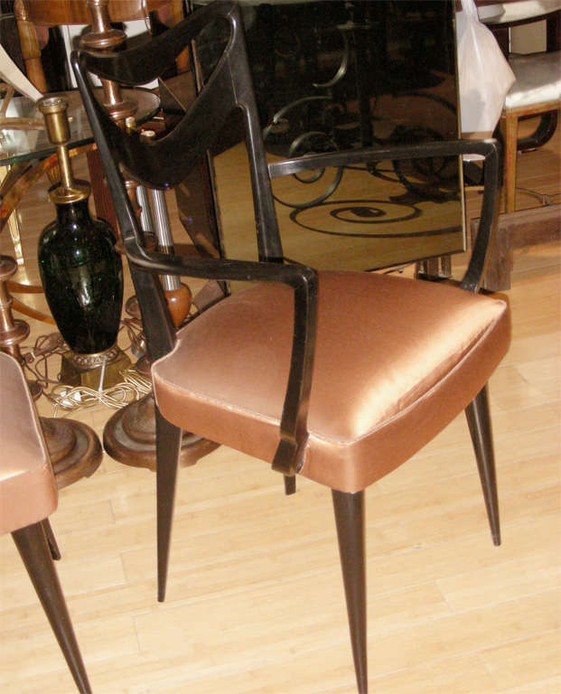 Set of four chairs and two armchairs newly recovered in brow silk satin in the style of Igo Parisi.