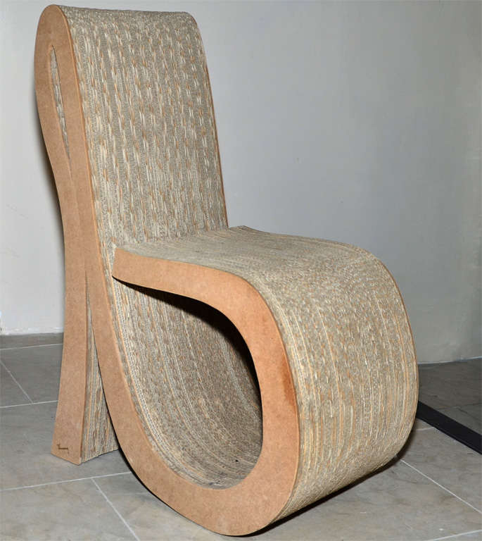 Elegant cardboard side chair.
signed Yvon farruseng on the side