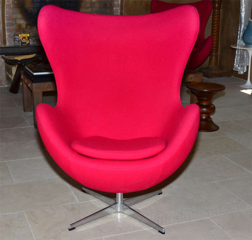 Danish Pair of swivel tilt red egg chair by Arne Jacobsen For Sale